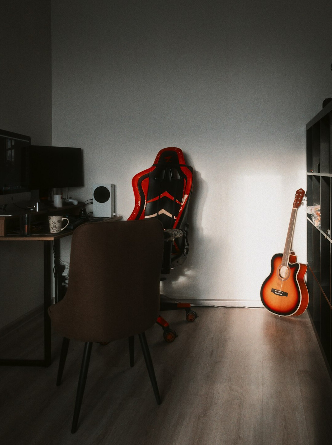 Video editing suite with a colour grading monitor and mixing console